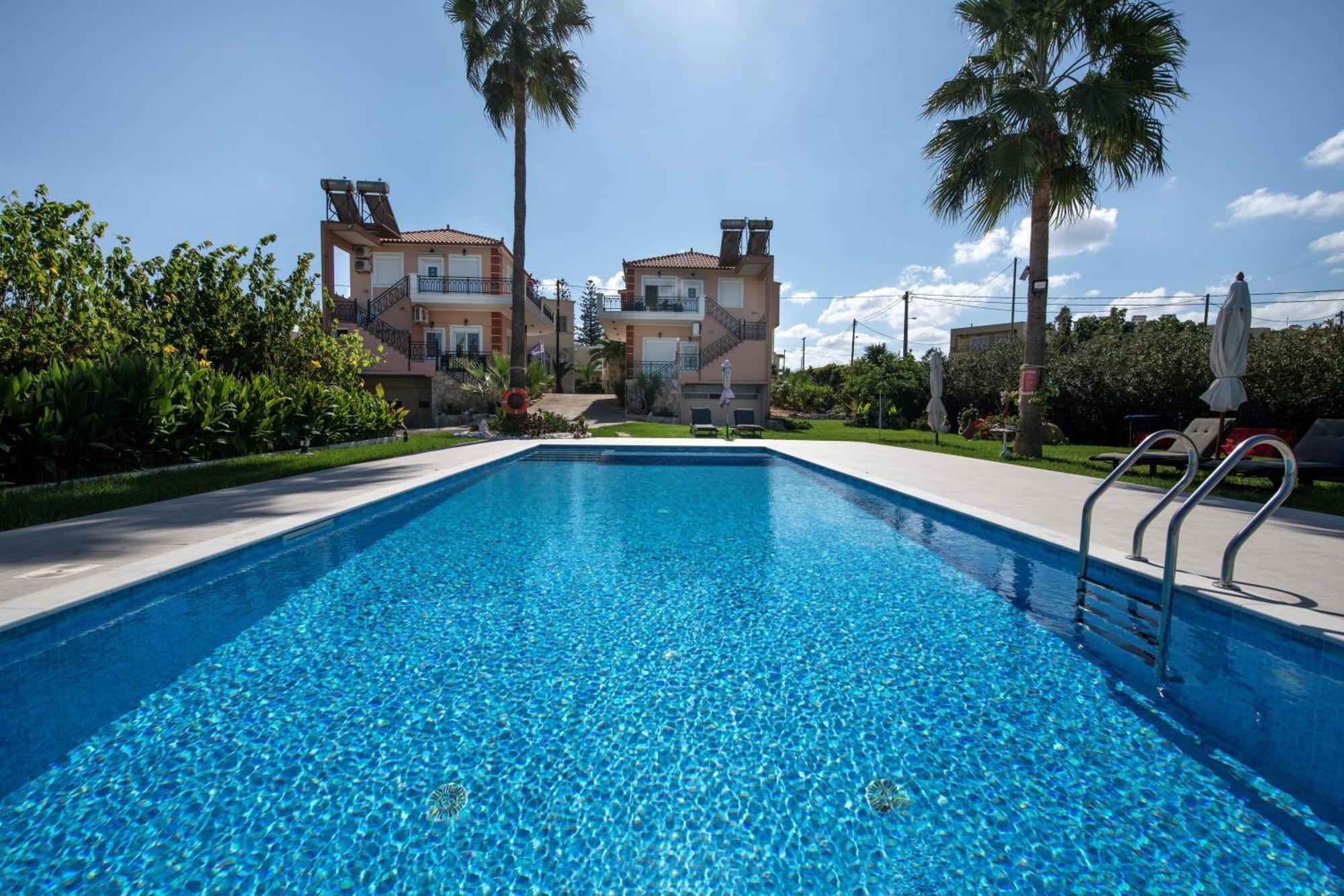 Апартаменты Socrate's Apartment's With Share Pool Камисиана